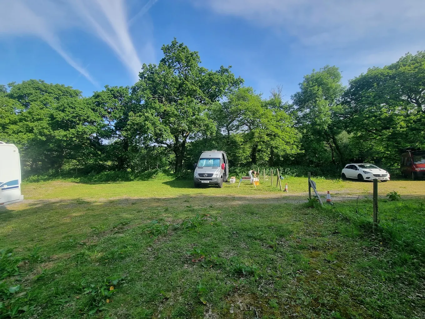 Campervans and caravans pitched on the campsite