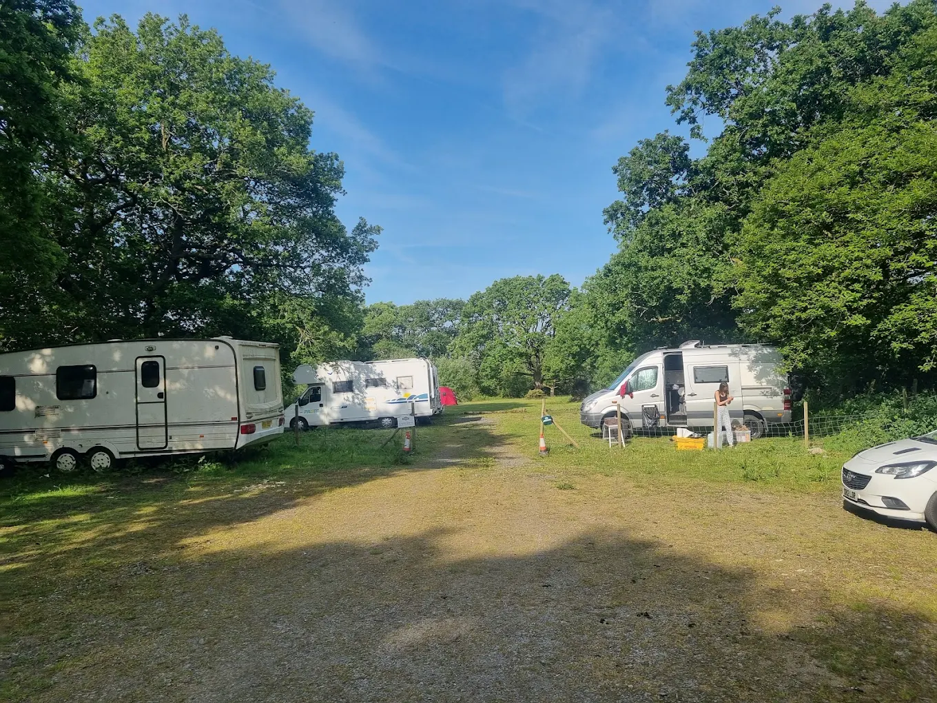 Caravans on the campsite beneath open sky