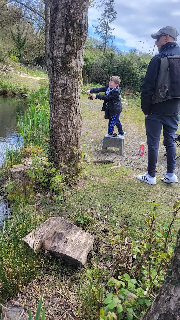 Families fishing at the lakeside